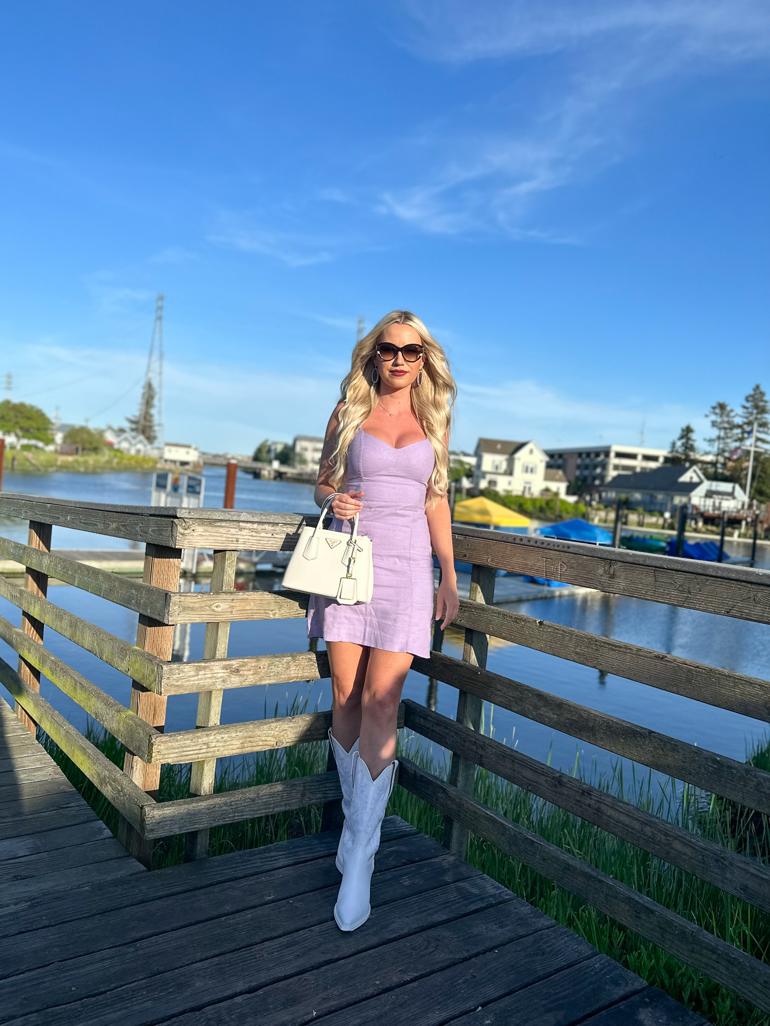 Lavender mini dress and white Western boots
